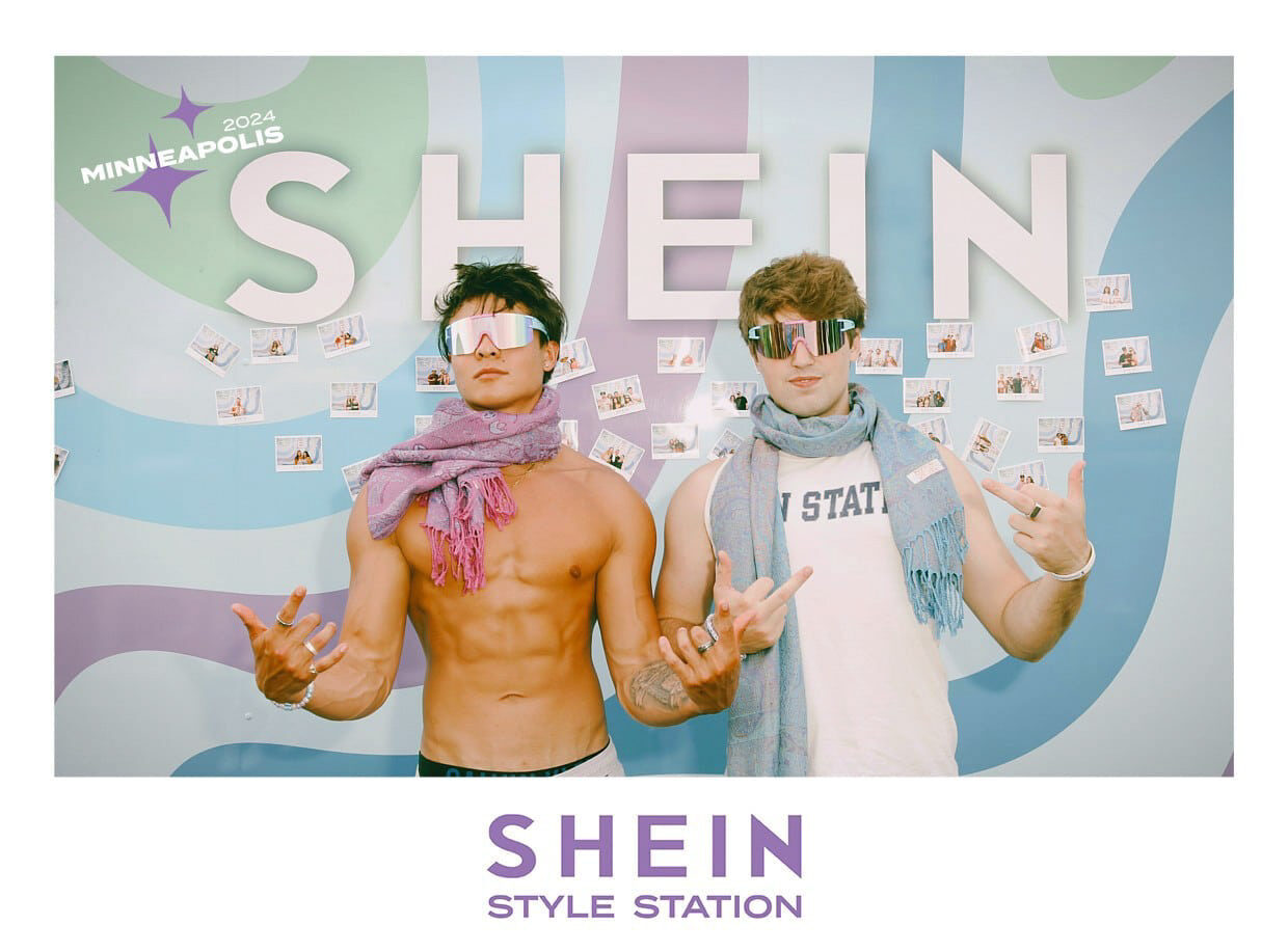 Two festival guests posing in a SHEIN Polaroid souvenir photo
