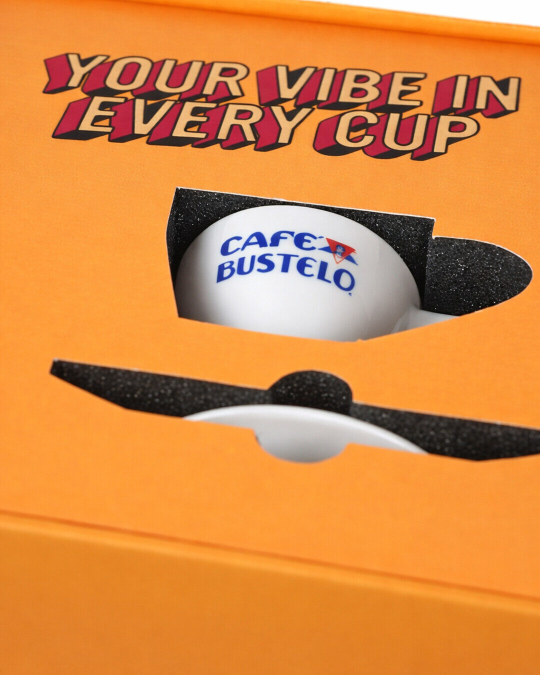 Your Vibe in Every Cup message above Café Bustelo drinkware