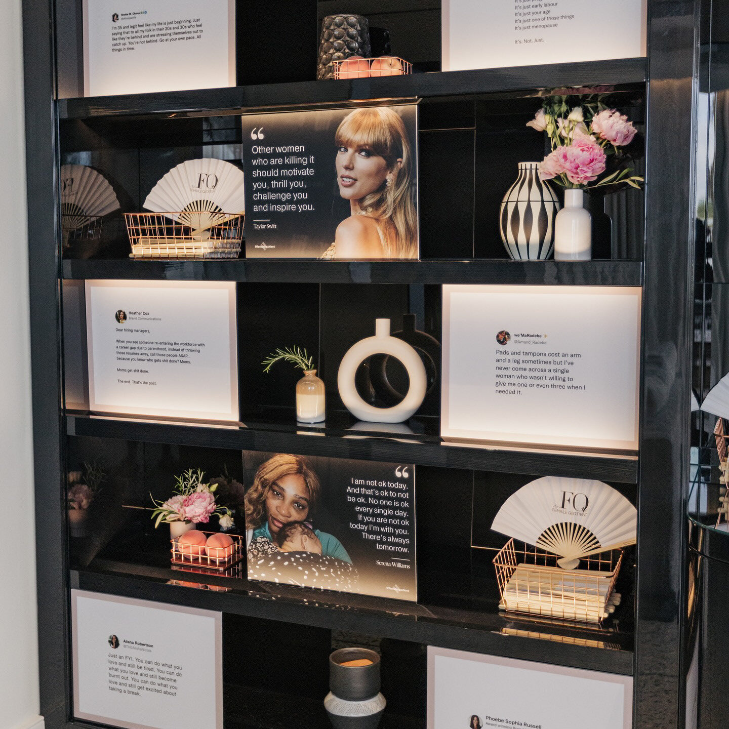 Illuminated social quotes and FQ details displayed inside the lounge
