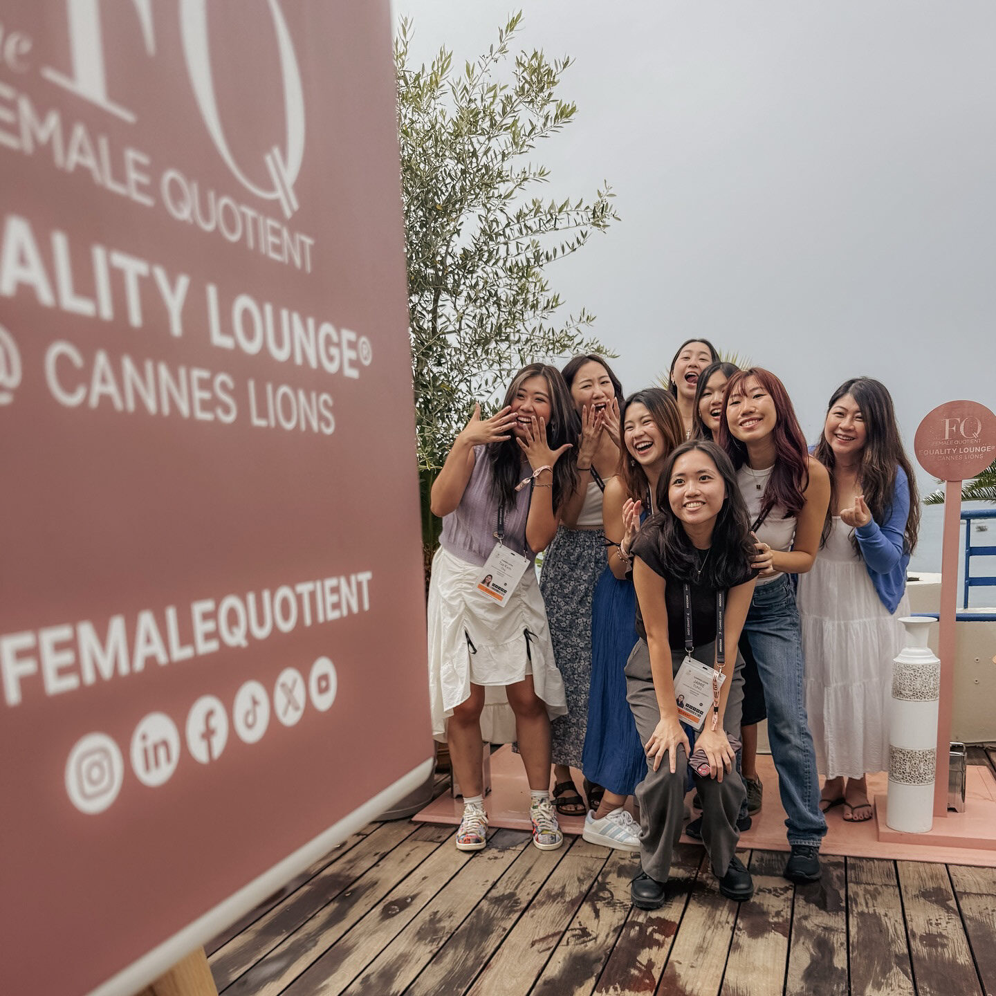 Guests gathering at the Female Quotient terrace photo moment