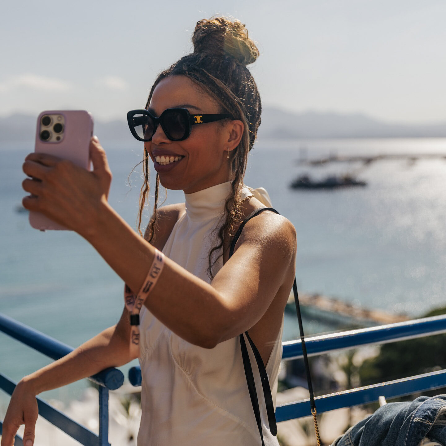 Guest capturing a social moment above the Cannes coastline