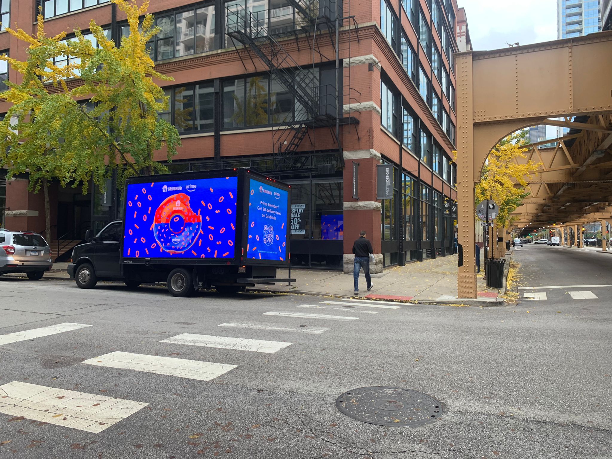 LED billboard truck teasing the $0 delivery offer on a Chicago corner