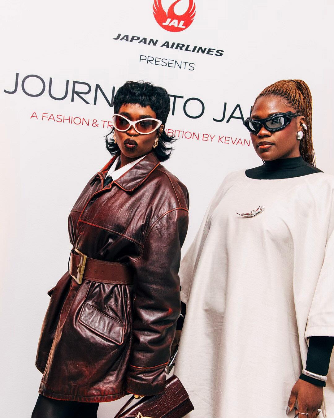 Guests at the Journey to Japan step-and-repeat wall presented by Japan Airlines