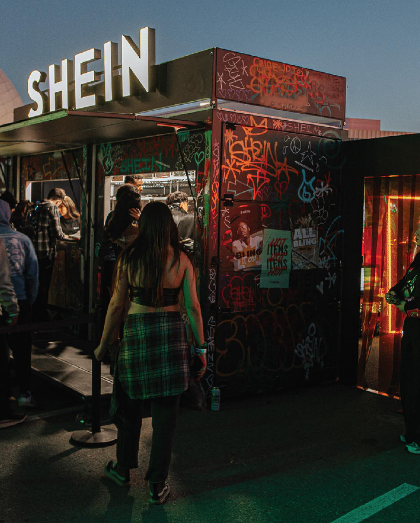 Guests arriving at the graffitied SHEIN Street activation