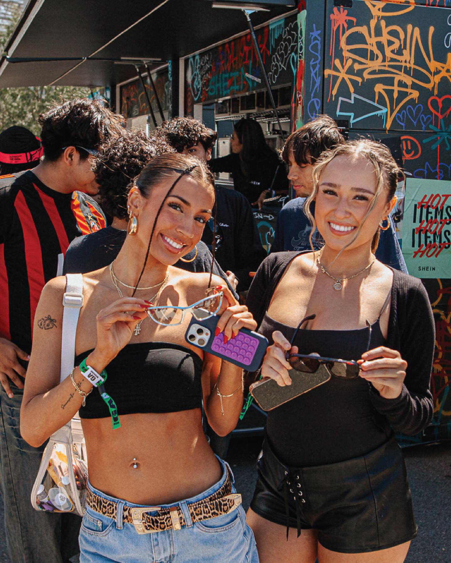 Festival guests showing accessories inside SHEIN Street