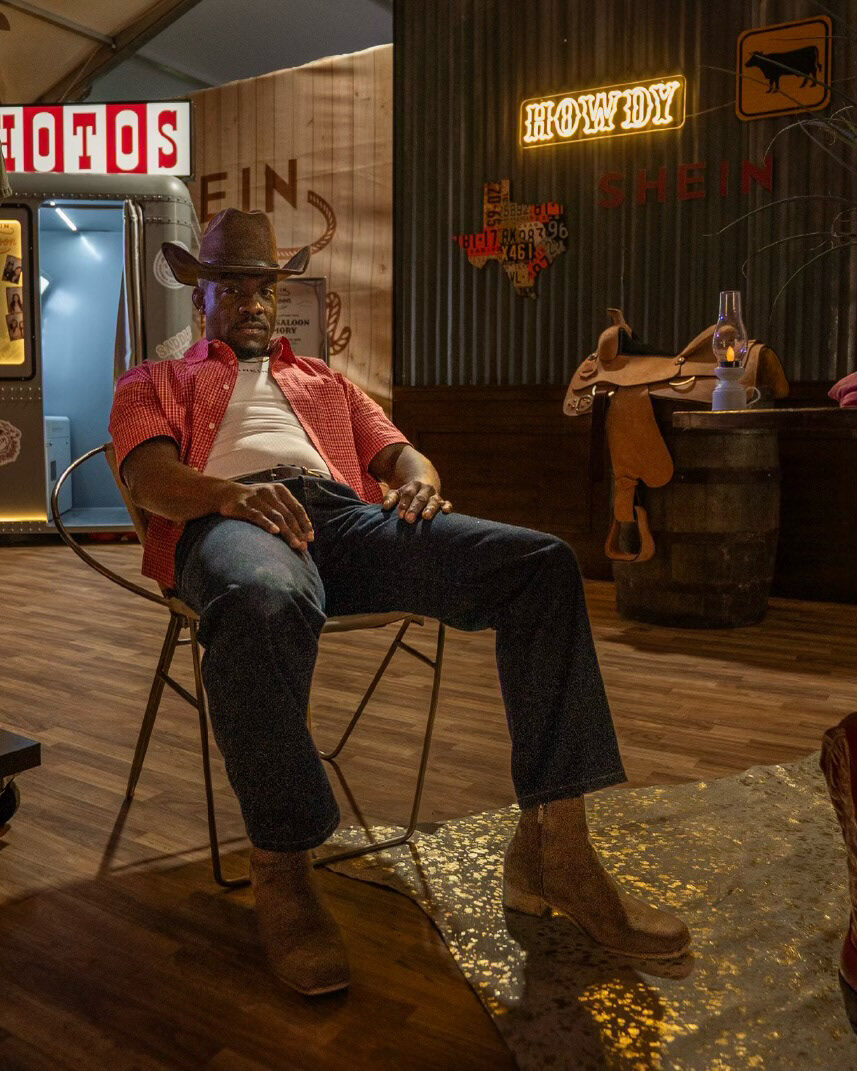 Guest posing in a cowboy chair portrait moment