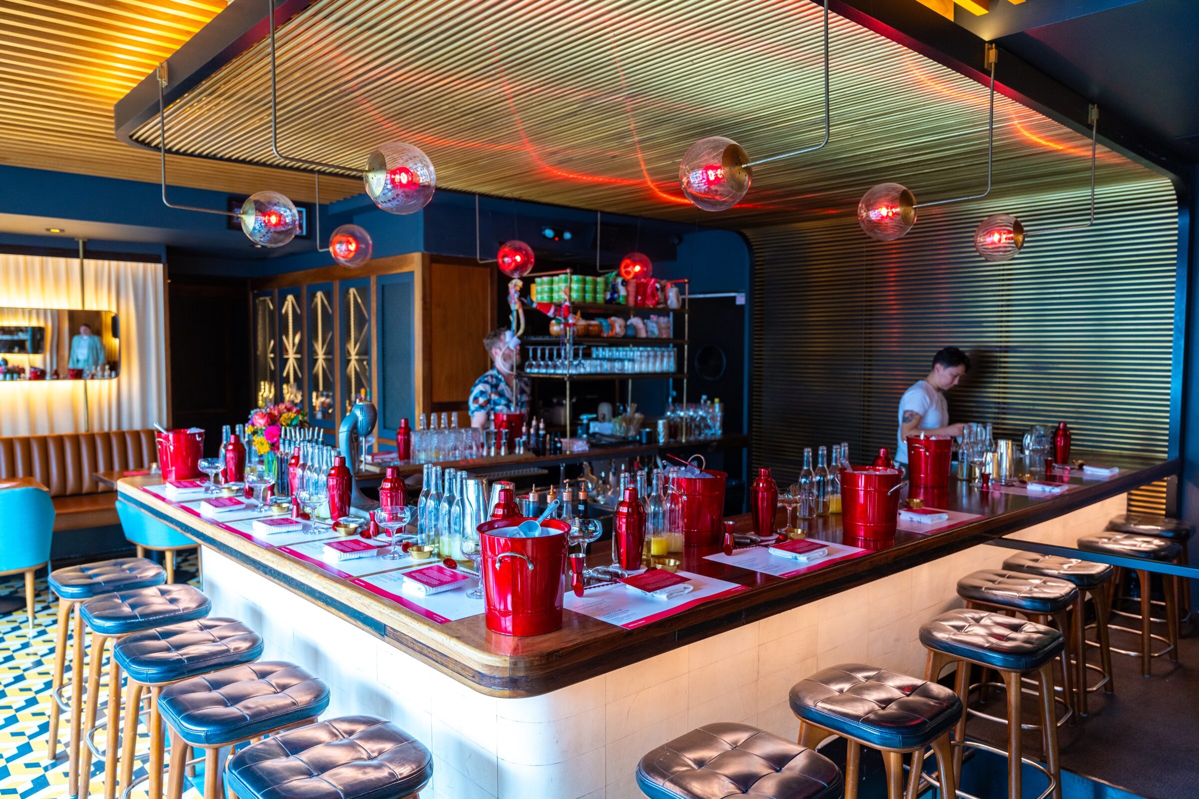 The Wells Fargo Autograph Journey mixology class set with red cocktail tools