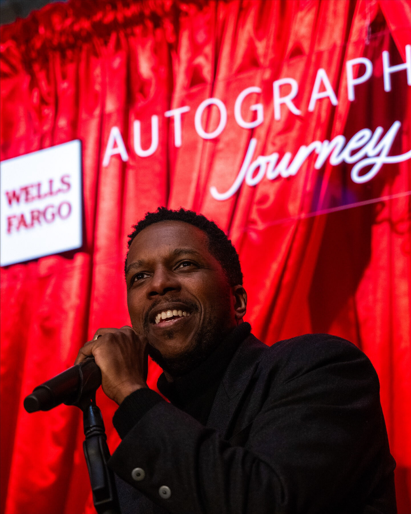 Leslie Odom Jr performing at the private Wells Fargo event