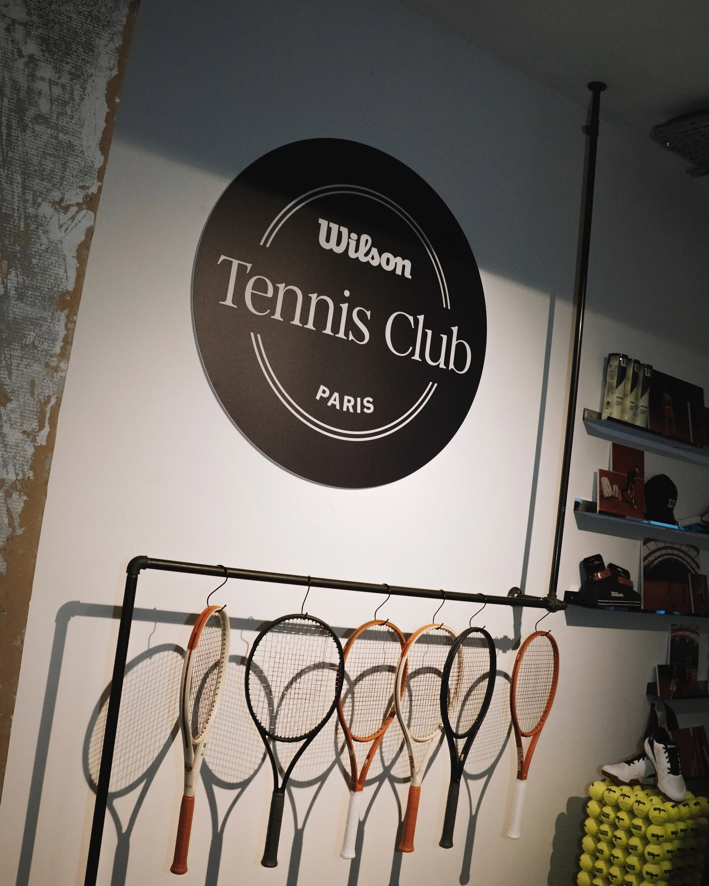 Wilson Tennis Club Paris identity and racquet display