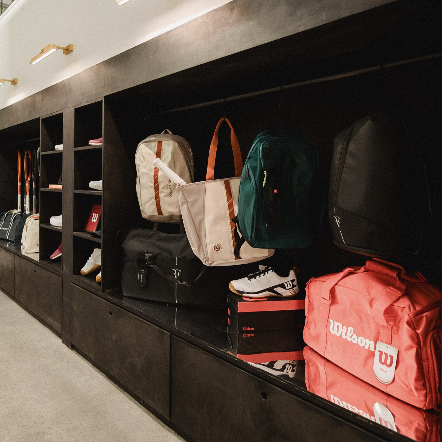 Wilson bags and equipment displayed in clubhouse lockers