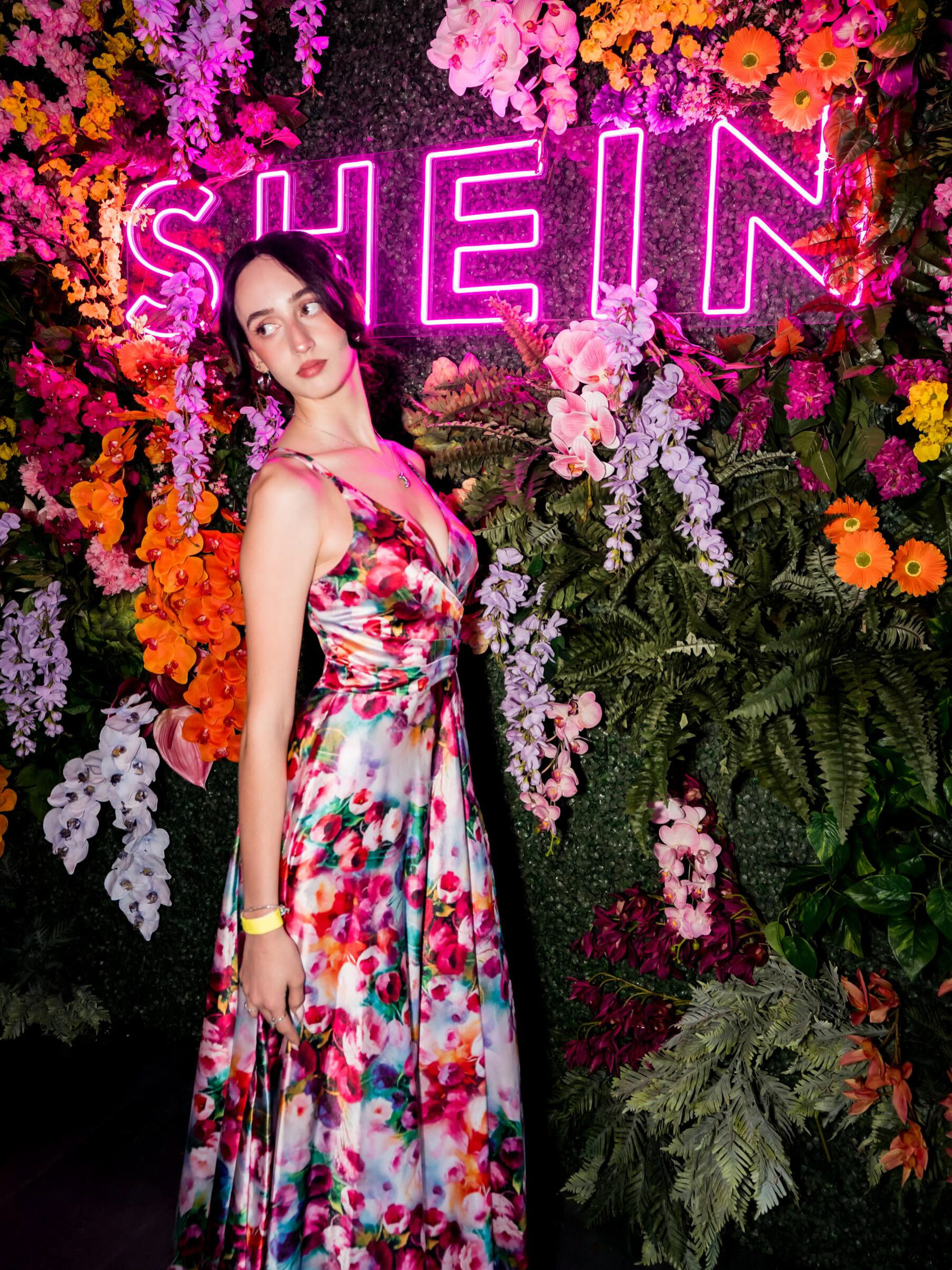 Guest at SHEIN floral neon wall