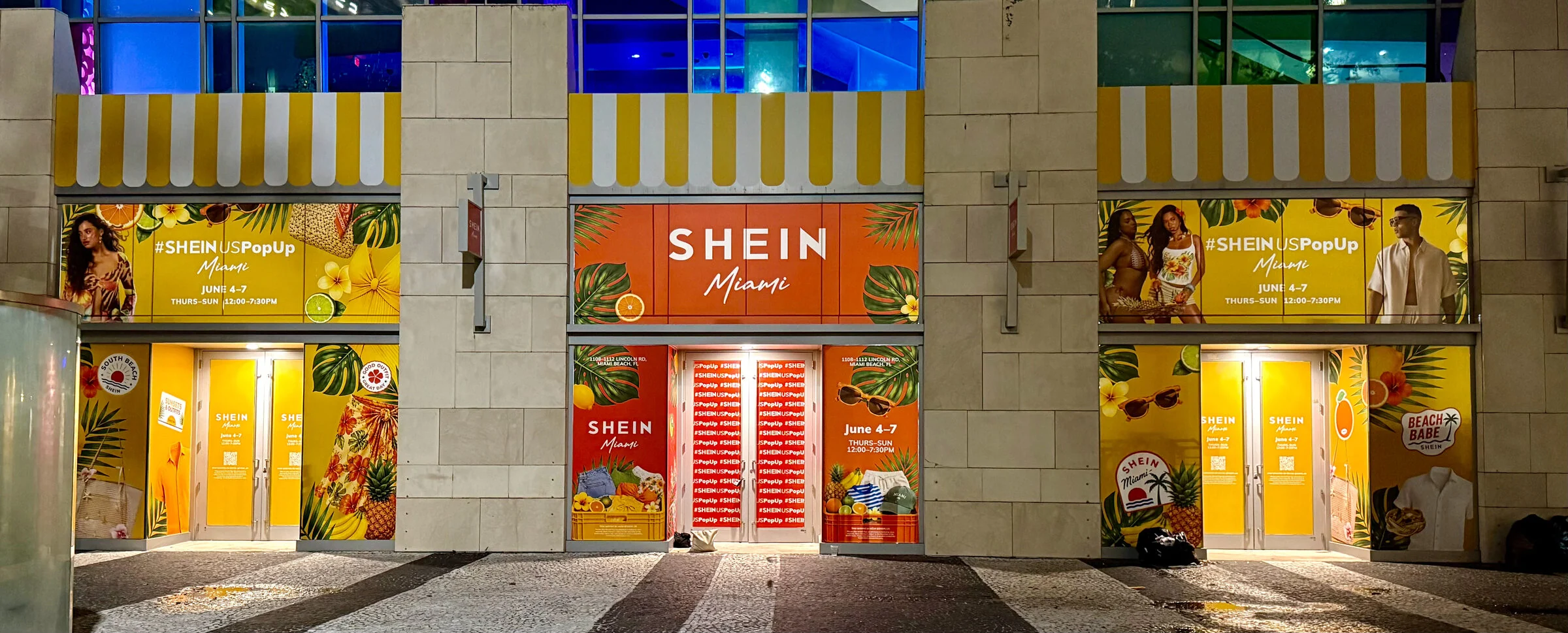 SHEIN Miami storefront building wraps at night